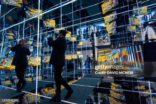 Samsung Sero rotating 4K televisions are shown at the 2020 Consumer Electronics Show in Las Vegas, Nevada on January 8, 2020. - CES is one of the...