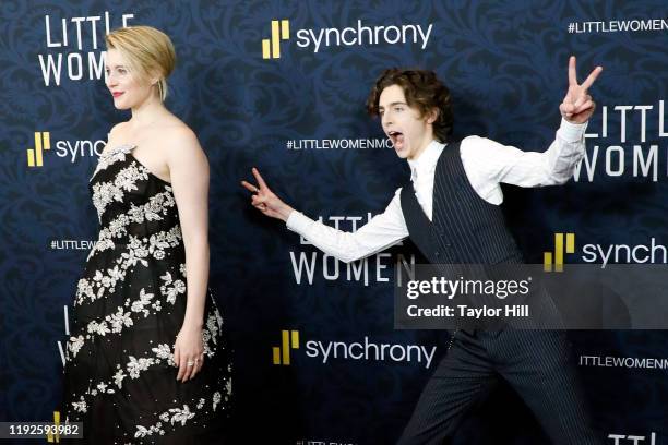 Timothee Chalamet photobombs Greta Gerwig at the world premiere of "Little Women" at Museum of Modern Art on December 07, 2019 in New York City.