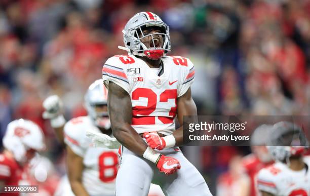 Jahsen Wint of the Ohio State Buckeyes celebrates during the BIG Ten Football Championship Game against the Wisconsin Badgers at Lucas Oil Stadium on...