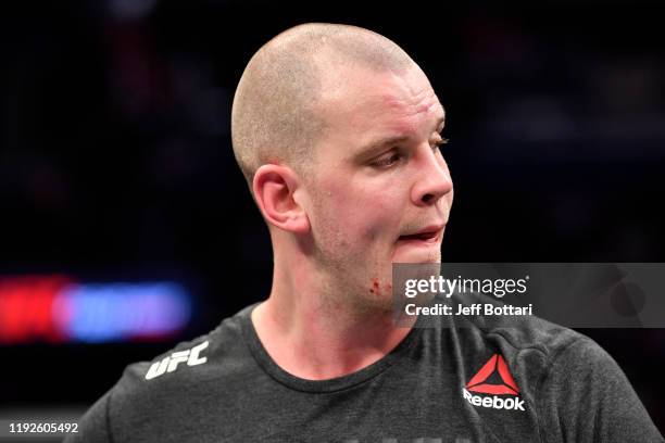 Stefan Struve of Netherlands reacts after his TKO loss to Ben Rothwell in their heavyweight bout during the UFC Fight Night event at Capital One...