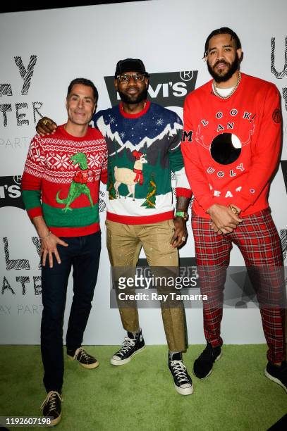 Los Angeles Lakers General Manager Rob Pelinka, NBA players LeBron James, and JaVale McGee attend the 2nd Annual Juglife Ugly Sweater Holiday Party...