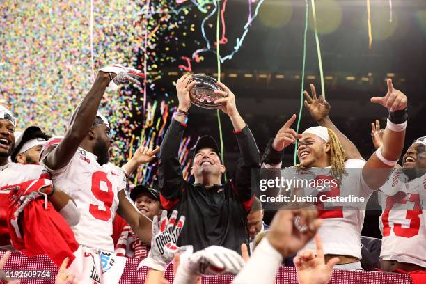 Head coach Ryan Day and the Ohio State Buckeyes celebrate after winning the Big Ten Championship against the Wisconsin Badgers at Lucas Oil Stadium...