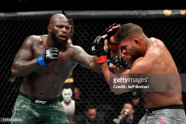 Jairzinho Rozenstruik of Suriname punches Alistair Overeem of Netherlands in their heavyweight bout during the UFC Fight Night event at Capital One...