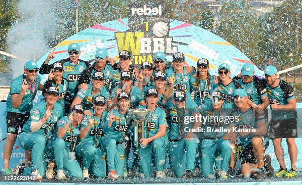 The Brisbane Heat celebrate victory after the 2019 Women's Big Bash League Final match between the Brisbane Heat and the Adelaide Strikers at Allan...