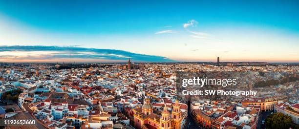sunrise panorama view of the seville old town cityscape - seville fotografías e imágenes de stock