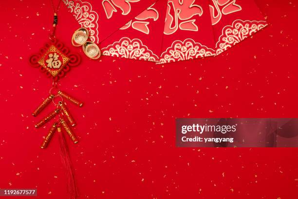 chinese new year decoration on a red background flag of good fortune and lump of gold - chinese new year 2019 stock pictures, royalty-free photos & images