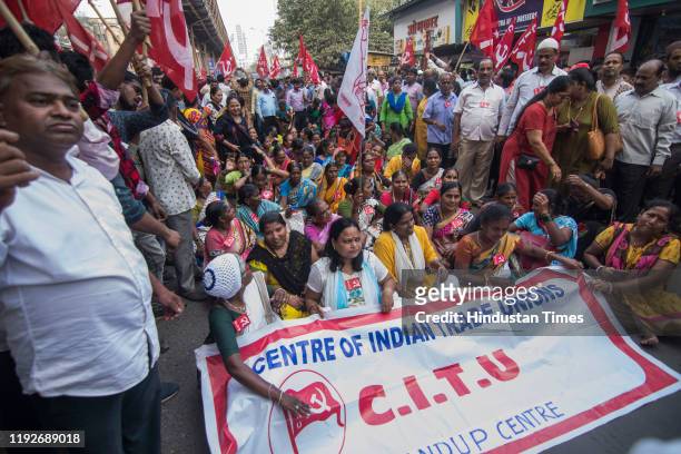 Members participate in a protest rally as Trade unions have called for Bharat Bandh against anti-worker policies of Central government at Bhandup, on...