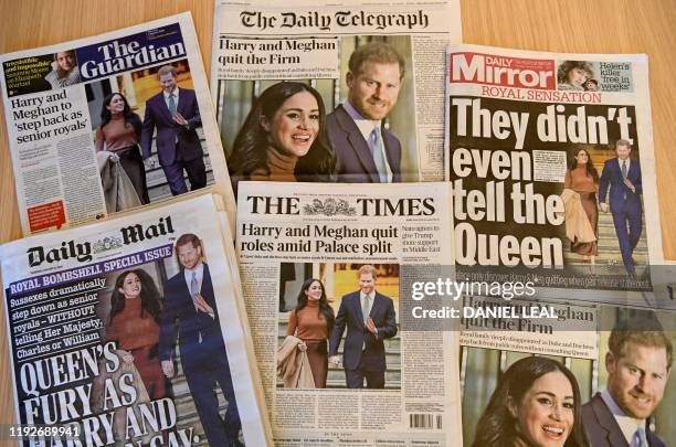 An arrangement of UK daily newspapers photographed as an illustration in London on January 9 shows front page headlines reporting on the news that...