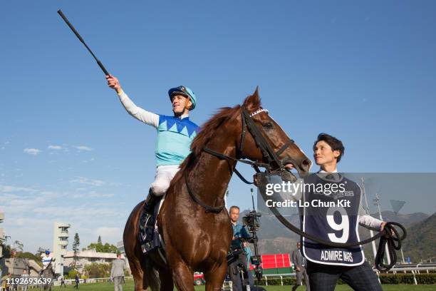 December 8 : Jockey Christophe Soumillon riding Japanese runner Admire Mars wins the Race 7 Longines Hong Kong Mile at Sha Tin Racecourse on December...