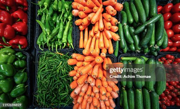 fresh and coulourful vegetables - greengrocer stock pictures, royalty-free photos & images