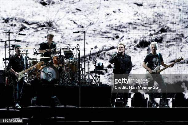The Edge, Larry Mullen Jr., Bono and Adam Clayton of U2 perform on stage during 'U2 The Joshua Tree Tour 2019' at the Gocheok Sky Dome on December...