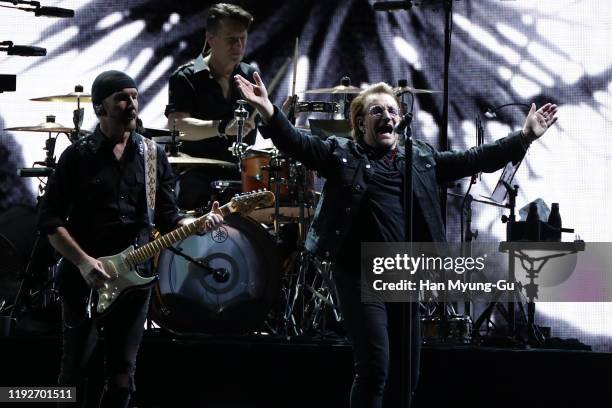 The Edge, Larry Mullen Jr. And Bono of U2 perform on stage during 'U2 The Joshua Tree Tour 2019' at the Gocheok Sky Dome on December 08, 2019 in...