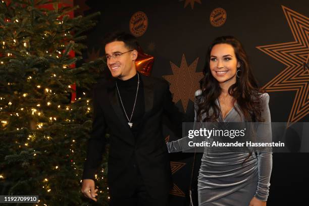 Philippe Coutinho of FC Bayern Muenchen attends with his wife Aine Coutinho the clubs Christmas party at Allianz Arena on December 08, 2019 in...