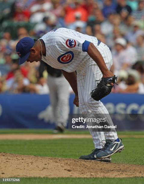 Carlos Marmol of the Chicago Cubs yells after giving up a hit in the 9th inning to the Florida Marlins at Wrigley Field on July 15, 2011 in Chicago,...