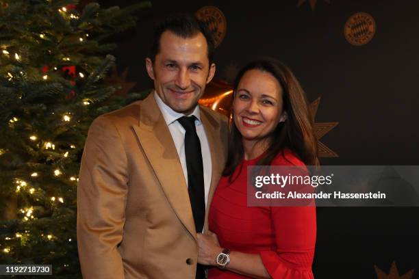 Hasan Salihamidzic of FC Bayern Muenchen attends with his wife Esther Copado the clubs Christmas party at Allianz Arena on December 08, 2019 in...