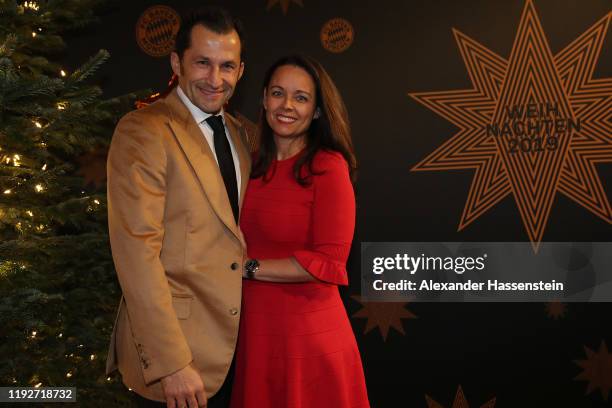 Hasan Salihamidzic of FC Bayern Muenchen attends with his wife Esther Copado the clubs Christmas party at Allianz Arena on December 08, 2019 in...