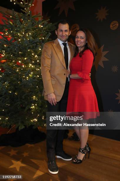 Hasan Salihamidzic of FC Bayern Muenchen attends with his wife Esther Copado the clubs Christmas party at Allianz Arena on December 08, 2019 in...