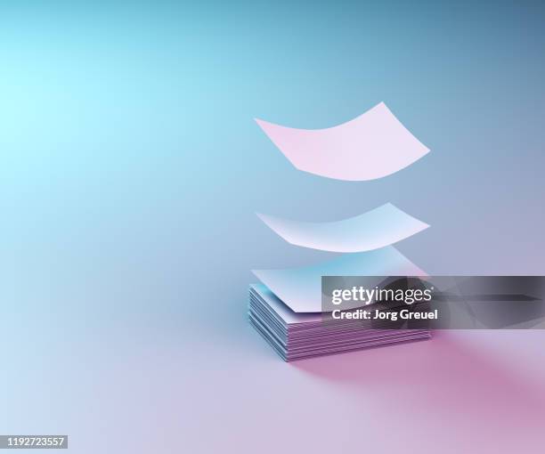 Paper Stack Flyig Flying Paper Sheets Fotografías e imágenes de stock - Getty Images