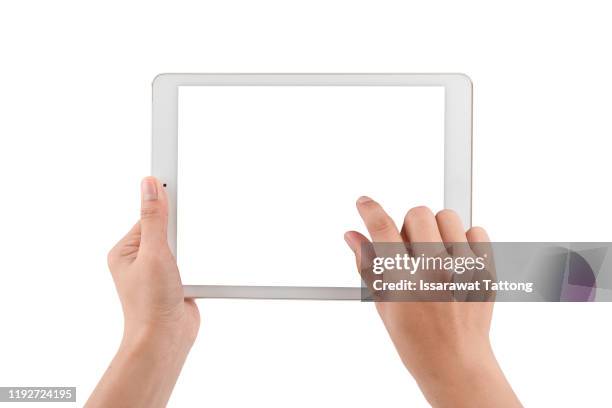 woman hands holding a tablet isolated on white - finger tablet stock pictures, royalty-free photos & images