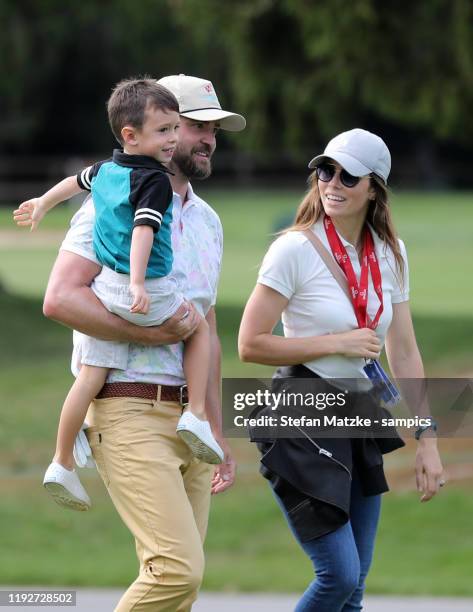 Justin Timberlake holds his son Silas next to his wife Jessica Biel ahead of the Pro-Am prior to the start of the Omega European Masters at at Crans...