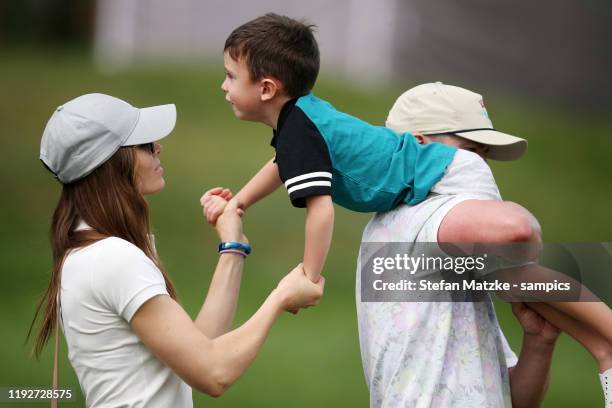 Justin Timberlake holds his son Silas next to his wife Jessica Biel ahead of the Pro-Am prior to the start of the Omega European Masters at at Crans...