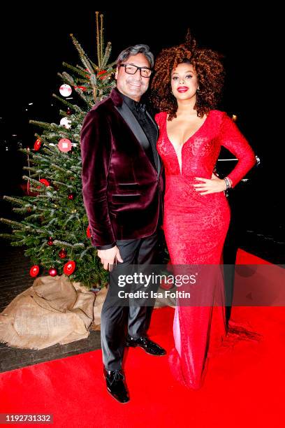 Mousse T. And his partner Khadra Sufi during the Daimlers "BE A MOVER" event at Ein Herz Fuer Kinder Gala at Studio Berlin Adlershof on December 7,...