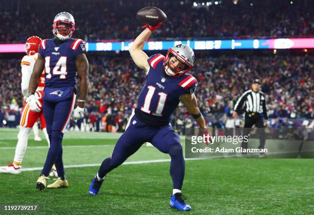 Julian Edelman of the New England Patriots celebrates scoring a touchdown during the first quarter against the Kansas City Chiefs in the game at...