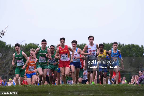 Athletes compete during the U2O Men's race of the SPAR European Cross Country Championships at the Parque da Bela Vista on December 08, 2019 in...