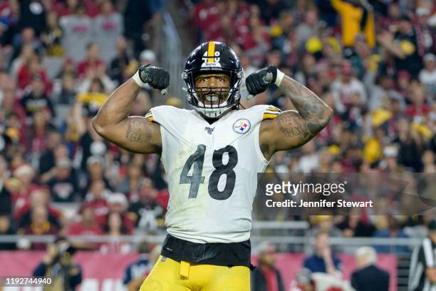 Outside linebacker Bud Dupree of the Pittsburgh Steelers celebrates a sack on quarterback Kyler Murray in the first half of the NFL game at State...