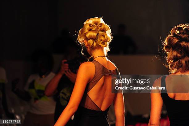 Model walks the runway prior to the Beach Bunny Swimwear show during Mercedes-Benz Fashion Week Swim on July 15, 2011 in Miami Beach, Florida.