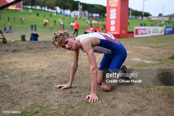 Jenny Nesbitt of Norway lies on the ground after his finished during the U2O Men's race of the SPAR European Cross Country Championships at the...