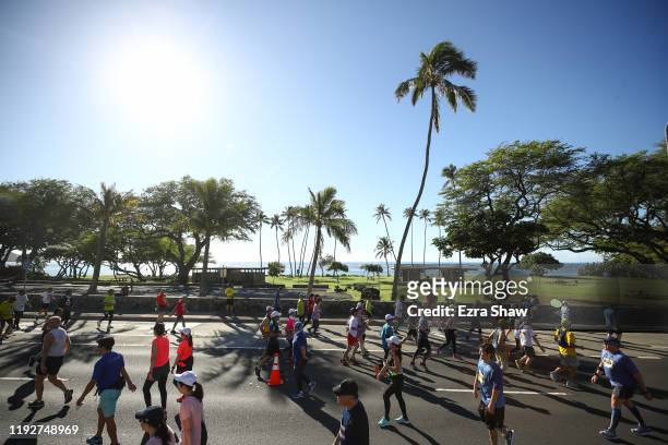 Runners run east side of Oahu during the Honolulu Marathon 2019 on December 08, 2019 in Honolulu, Hawaii.