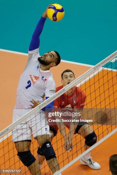 Earvin Ngapeth of France, Jenia Grebennikov of France during the match between Slovenia v France at the Max-Schmeling-Halle on January 9, 2020 in...