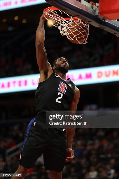 Kawhi Leonard of the Los Angeles Clippers dunks against the Washington Wizards during the first half at Capital One Arena on December 8, 2019 in...
