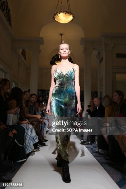 Model showcases at the Paul Costelloe show, Runway, Fall Winter 2019 during London Fashion Week at Simpsons the strand.