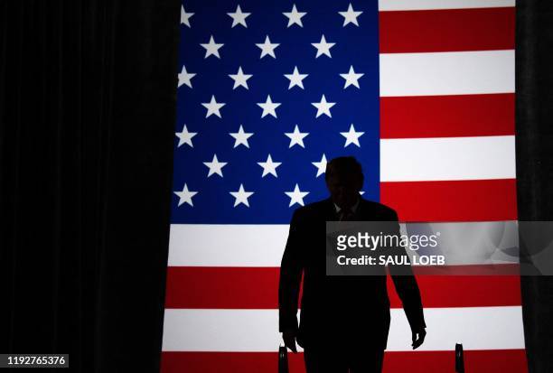 President Donald Trump arrives for a "Keep America Great" campaign rally at Huntington Center in Toledo, Ohio, on January 9, 2020.