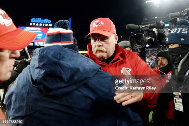 Head coach Bill Belichick of the New England Patriots shakes hands with head coach Andy Reid of the Kansas City Chiefs after the Kansas City Chiefs...