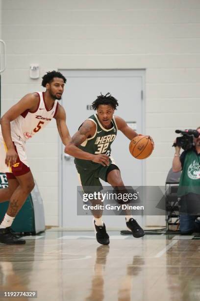 Jemerrio Jones of the Wisconsin Herd dribbles against Marques Bolden of the Canton Charge during an NBA G-League game on January 09, 2020 at...