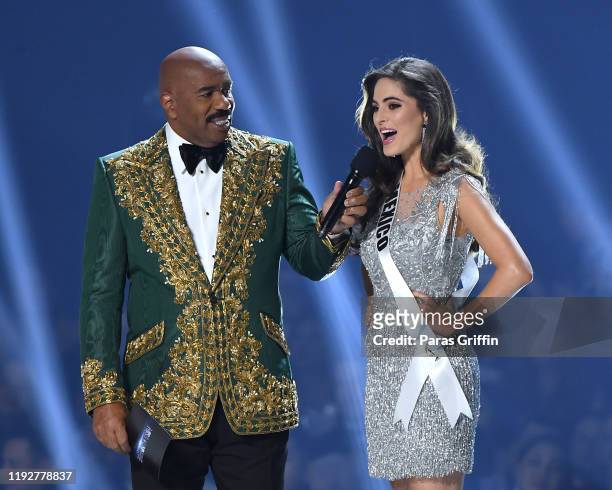 Steve Harvey interviews Miss Mexico Sofía Aragón onstage at the 2019 Miss Universe Pageant at Tyler Perry Studios on December 08, 2019 in Atlanta,...