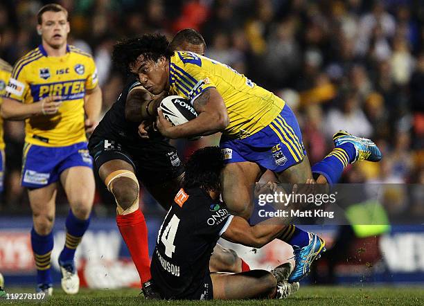 Fuifui Moimoi of the Eels is tackled during the round 19 NRL match between the Penrith Panthers and the Parramatta Eels at Centrebet Stadium on July...