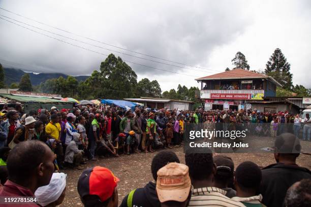 People watch Tiria Theatre Group perform in Wapenamanda District on December 06, 2019 in Enga Province, Papua New Guinea. Tiria Theatre Group...