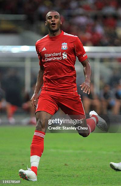 David Ngog of Liverpool celebrates after scoring against Malaysia during the pre-season friendly match between Malaysia and Liverpool at the Bukit...
