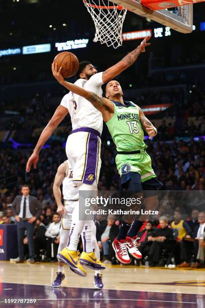 Shabazz Napier of the Minnesota Timberwolves shoots the ball as Anthony Davis of the Los Angeles Lakers defends during the first half at Staples...