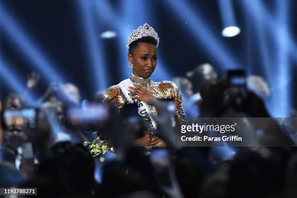 Miss Universe 2019 Zozibini Tunzi, of South Africa, is crowned onstage at the 2019 Miss Universe Pageant at Tyler Perry Studios on December 08, 2019...