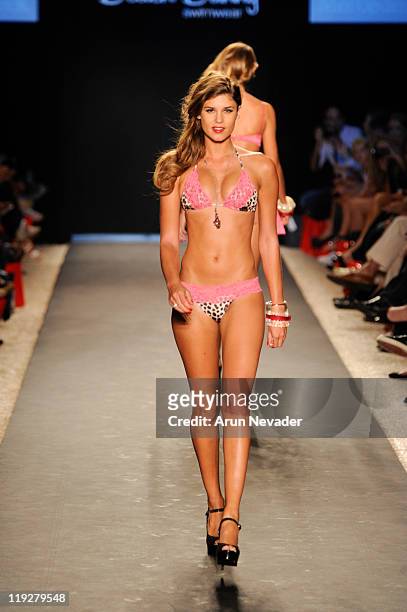 Models walk the runway for Beach Bunny during Mercedes-Benz Fashion Week Swim at The Raleigh on July 15, 2011 in Miami Beach, Florida.