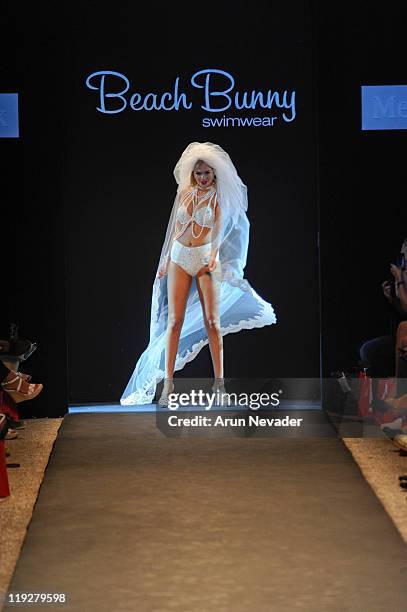 Model walks the runway for Beach Bunny during Mercedes-Benz Fashion Week Swim at The Raleigh on July 15, 2011 in Miami Beach, Florida.