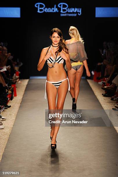 Models walk the runway for Beach Bunny during Mercedes-Benz Fashion Week Swim at The Raleigh on July 15, 2011 in Miami Beach, Florida.