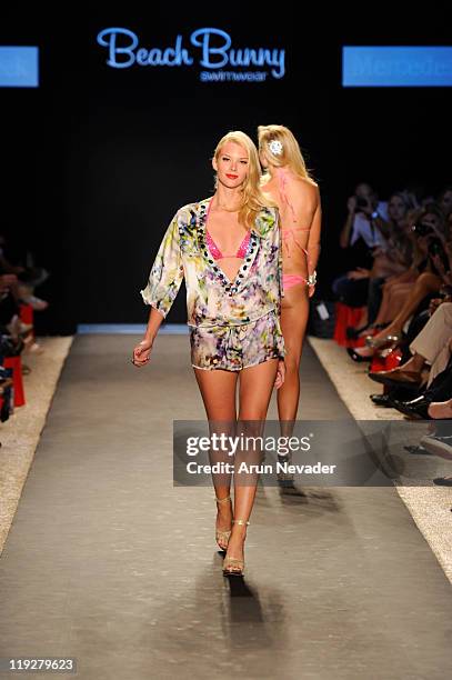 Models walk the runway for Beach Bunny during Mercedes-Benz Fashion Week Swim at The Raleigh on July 15, 2011 in Miami Beach, Florida.