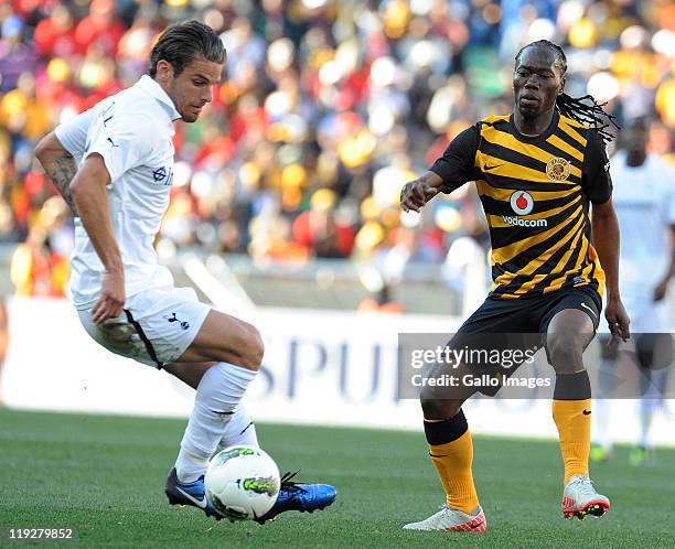 David Bentley of Tottenham Hotspur and Reneilwe Letsholonyane of Kaizer Chiefs in action during the 2011 Vodacom Challenge match between Kaizer...