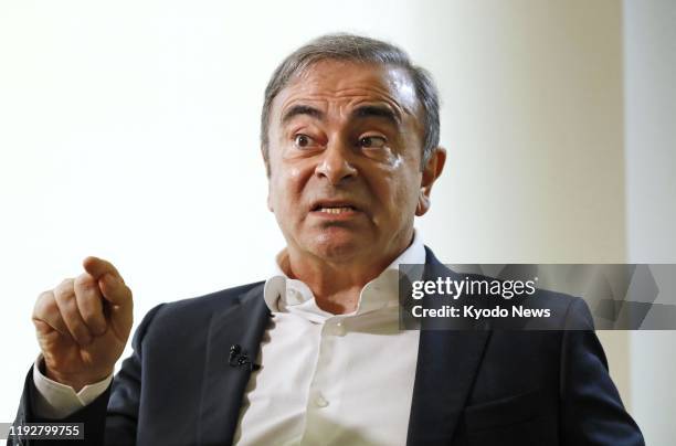 Former Nissan Motor Co. Chairman Carlos Ghosn speaks in a pool interview with Japanese media organizations in Beirut on Jan. 10, 2020.